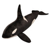 A black and white lifelike orca whale plush toy with a fin.