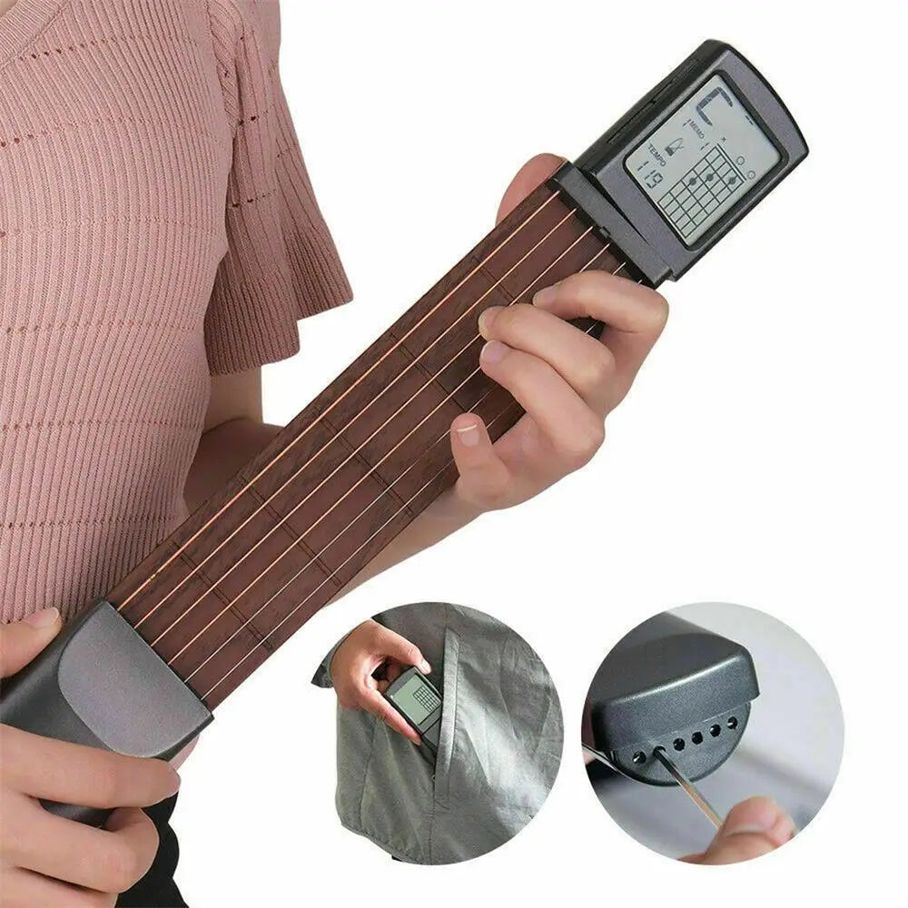 A hand holds a pocket guitar chord trainer with a rotatable LCD display and a separate tuning tool.