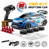 A blue 4WD RC drifting car is shown with a remote control, tires, and a map on a white surface.