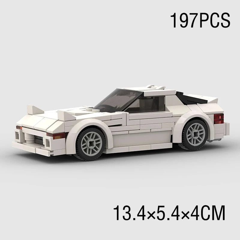 A white classic rally car building block set with a black roof and detailed features.