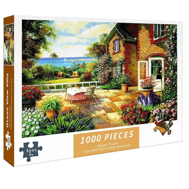 A 1000-piece jigsaw puzzle depicting a scenic outdoor view with a house, garden, and ocean landscape.