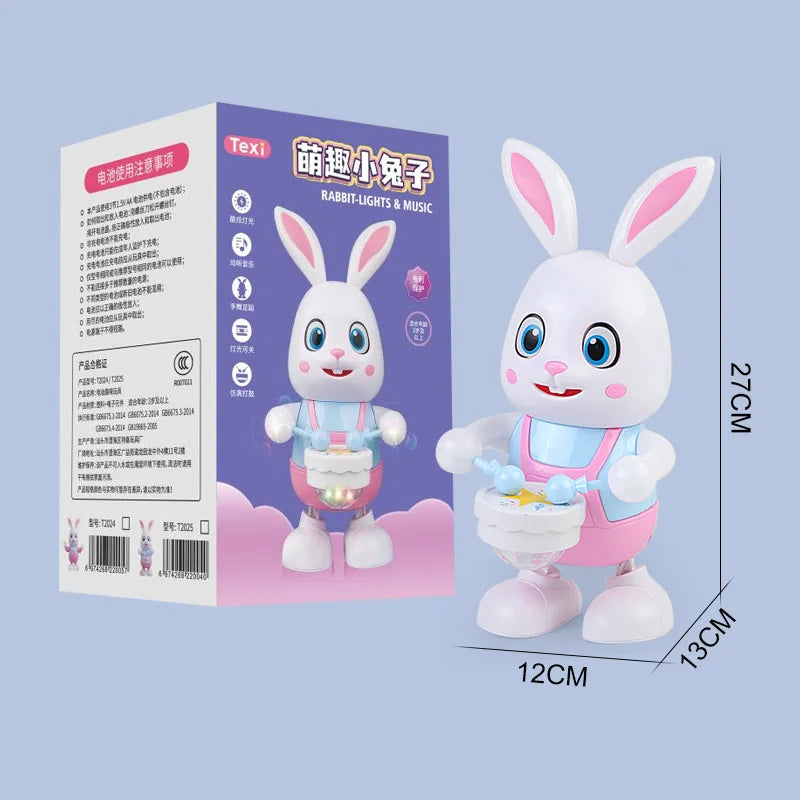 A white rabbit-shaped musical robot toy with pink accents and LED lights, standing on a display card.