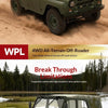 A dark olive green 1/12 scale 4WD off-road RC rock crawler truck driving through sand.
