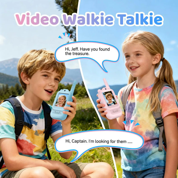 Two children are using a pink video walkie talkie set outdoors in a grassy field.