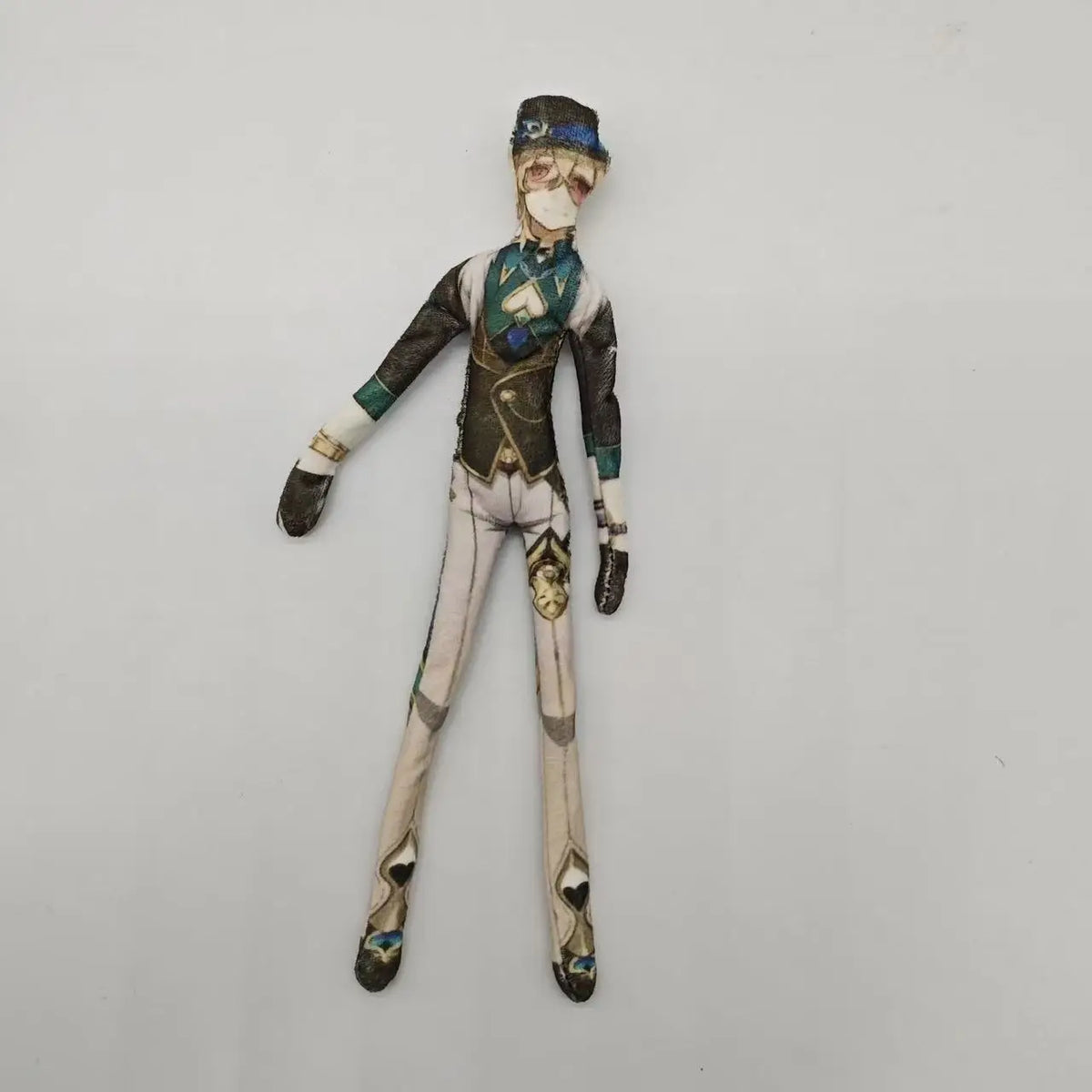 A poseable plush doll figure dressed in a military-style uniform with a helmet and mask.