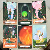 A collection of tarot cards featuring woodland fairy tale illustrations and botanical art, including Swords and Knight of Swo