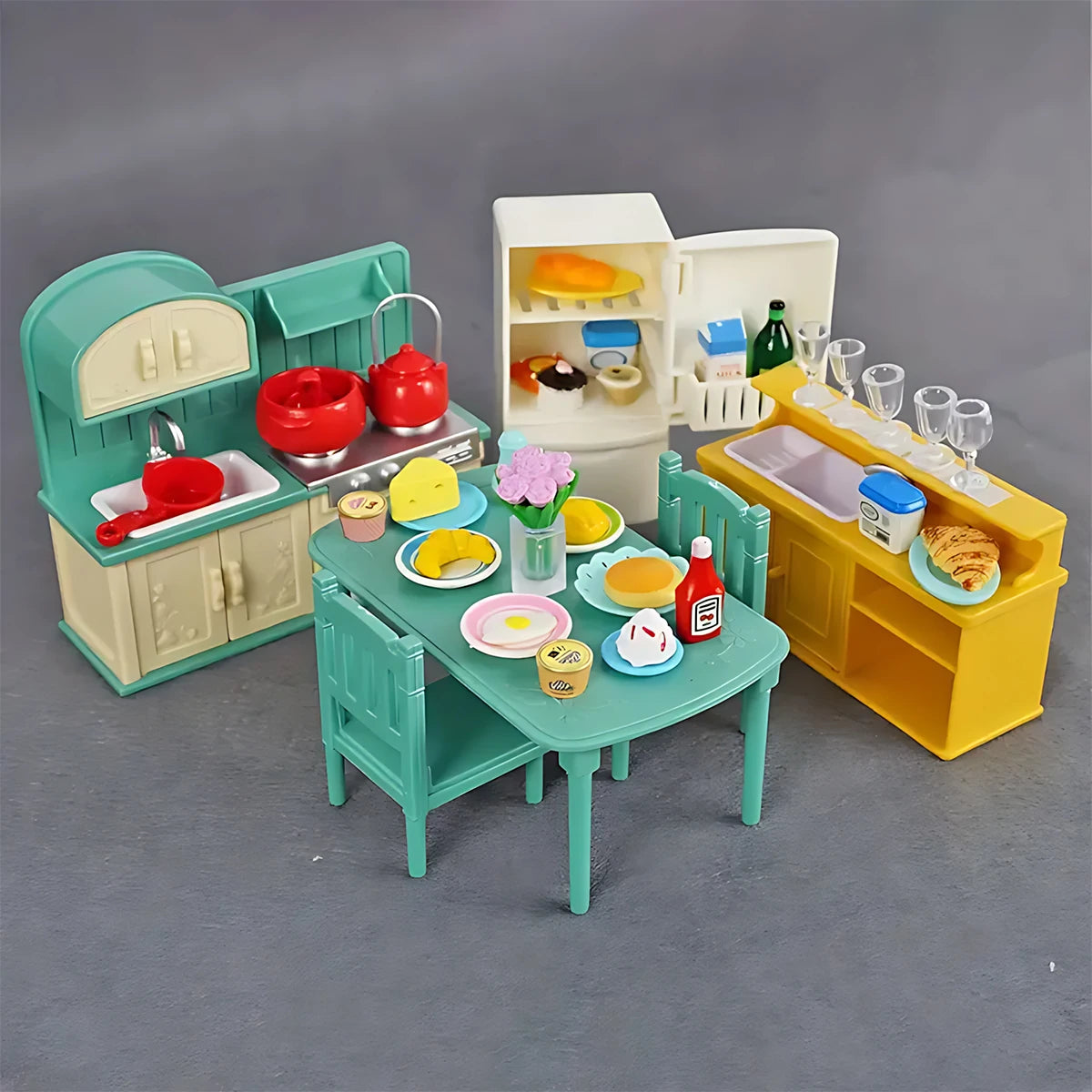 A miniature dollhouse furniture set featuring a kitchen and bathroom display with various colorful ceramic and plastic items.