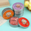 A stack of ten purple tins labeled Wen-Qing Slime Studio with orange and red accents, next to an open tin.