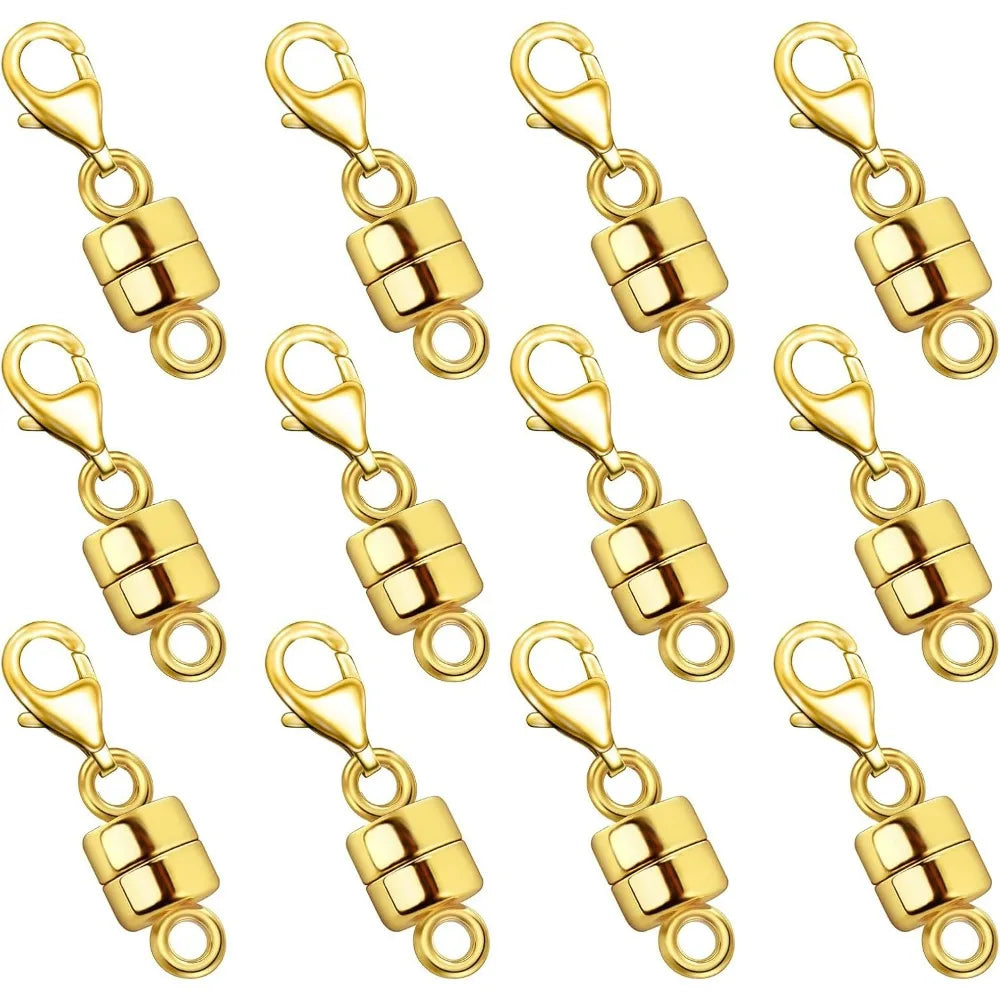 A set of gold-colored magnetic jewelry clasps for necklaces and bracelets.