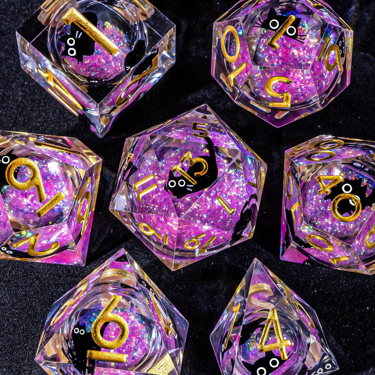 A collection of handmade liquid core resin dice set with sharp edges in various colors and angles.