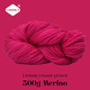 A ball of bright pink merino wool yarn, labeled as Lirisnly's hand-picked 300g Merino.