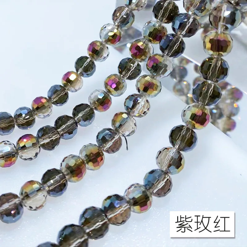 A set of 10mm Austrian crystal beads with AB coating in various shades of brown and purple.