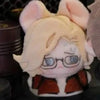 A plush doll set featuring characters Leon and Ashley from Resident Evil 9 with light blonde hair and glasses.