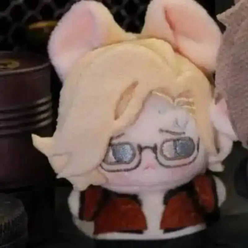 A plush doll set featuring characters Leon and Ashley from Resident Evil 9 with light blonde hair and glasses.