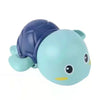 A wind-up swimming duck bath toy featuring a blue shell and light blue body.