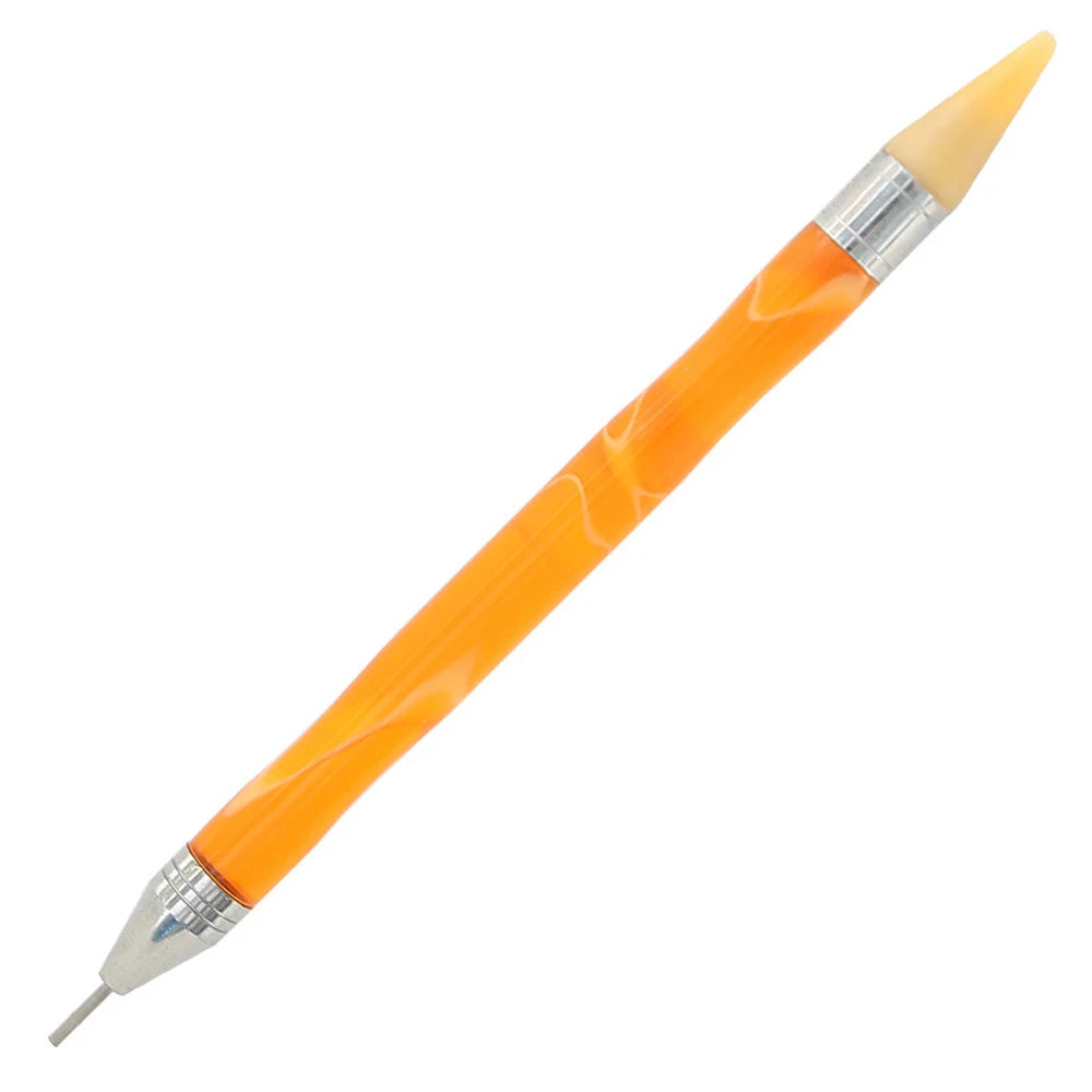 An orange double-head diamond painting pen with a wax tip shown diagonally.