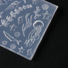 Clear silicone molds featuring various ocean life such as starfish, sea plants, and shells for nail art