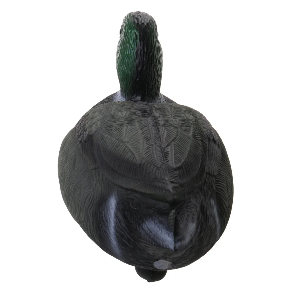 A dark, realistic floating duck decoy with a green head and keel.