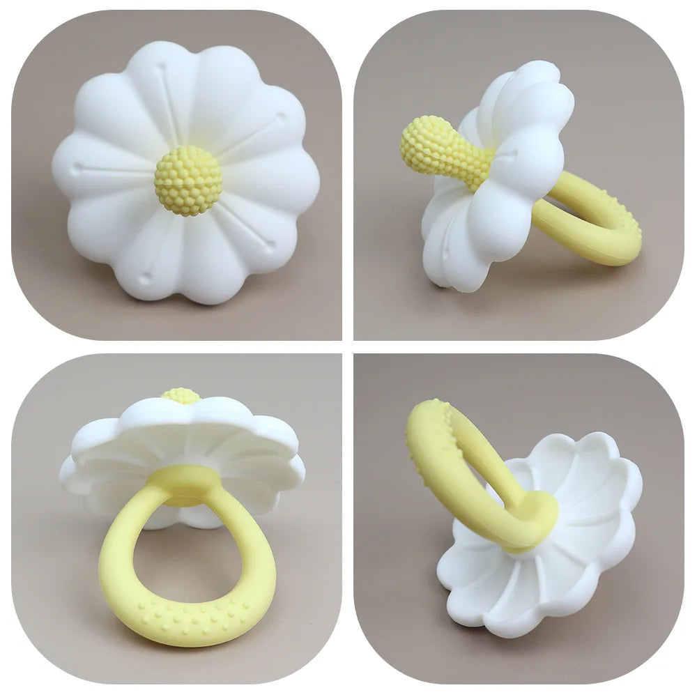 Weiße Silikonblume und Schnuller-Teether mit gelben Akzenten aus verschiedenen Blickwinkeln
