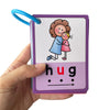 A purple card with a hand-drawn hug illustration and the word hug on it.