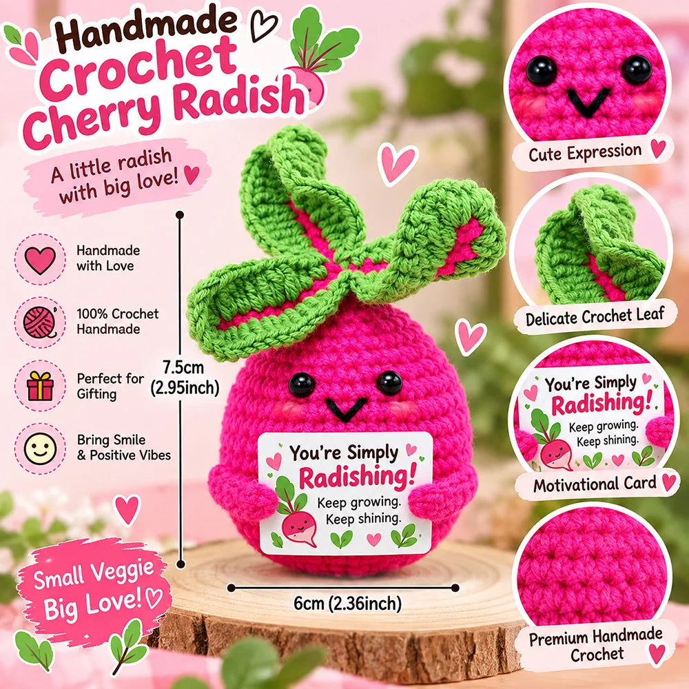 A handmade crochet cherry radish doll in pink and green with a motivational card.