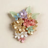 A cluster of colorful silicone flower petals in shades of purple, pink, green, and gold.