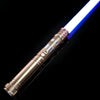 A close-up view of a heavy dueling lightsaber with a glowing blue blade and a metallic hilt against a black background.