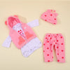 A pink and white romper set for a baby doll includes a hooded jacket and matching pants with polka dots.