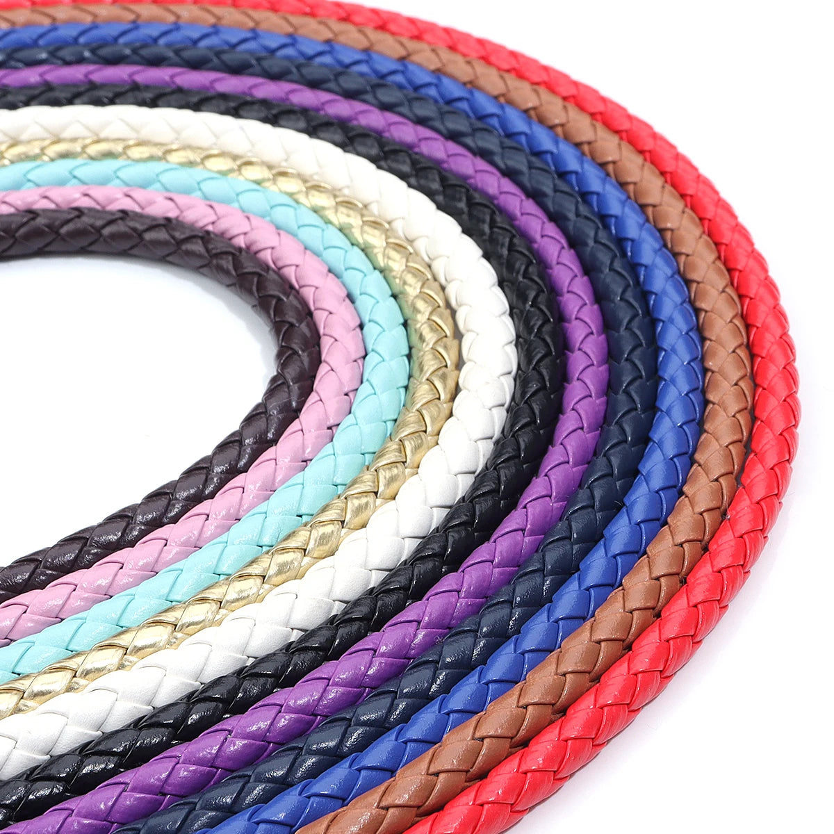 A collection of round braided leather cords in various colors including black, purple, blue, pink, white, and red.