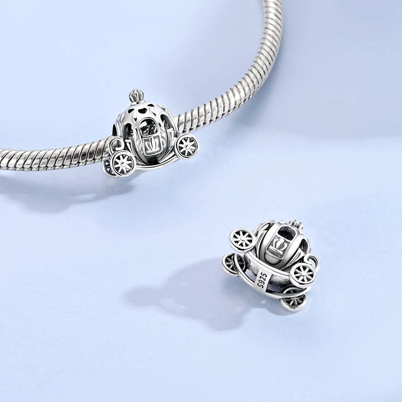 Sterling silver charm bead pendant featuring a car, key, and other elements on a chain.