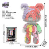A colorful brick art bear sculpture made of small colored blocks.