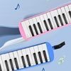 A pink 32-key portable melodica is shown alongside a blue 16-key instrument, with musical notes floating in the background.
