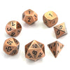 A set of ten premium metal polyhedral dice with a multicolor gold finish arranged on a white surface.