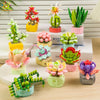 A collection of colorful succulent and flower building blocks in various shades of green, pink, yellow, and red arranged on a