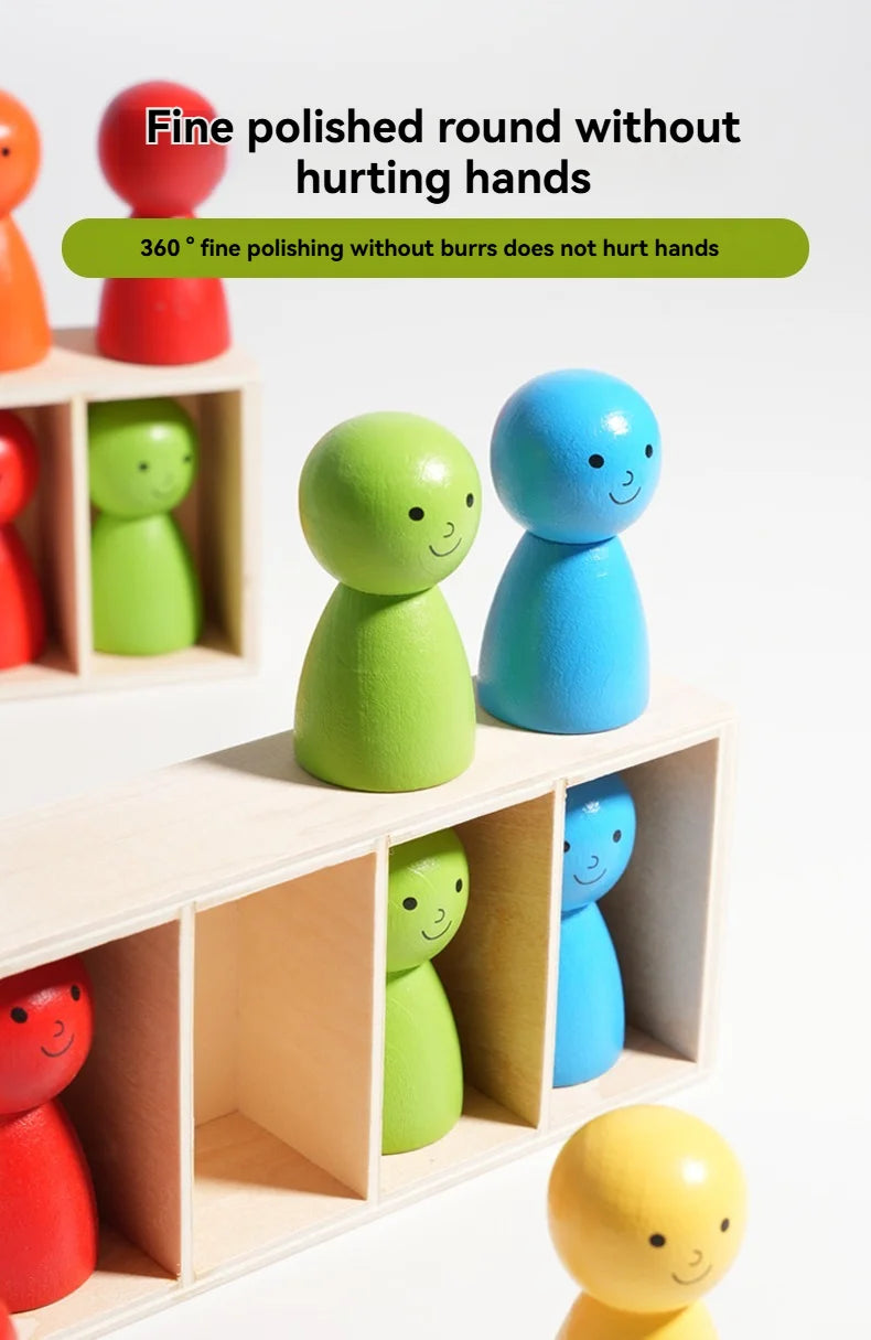 A set of fine polished round toys in various colors, including red, green, and blue, displayed in a wooden storage box.