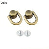 Two brass D-shaped metal bag handles with screws for DIY purse straps and craft hardware