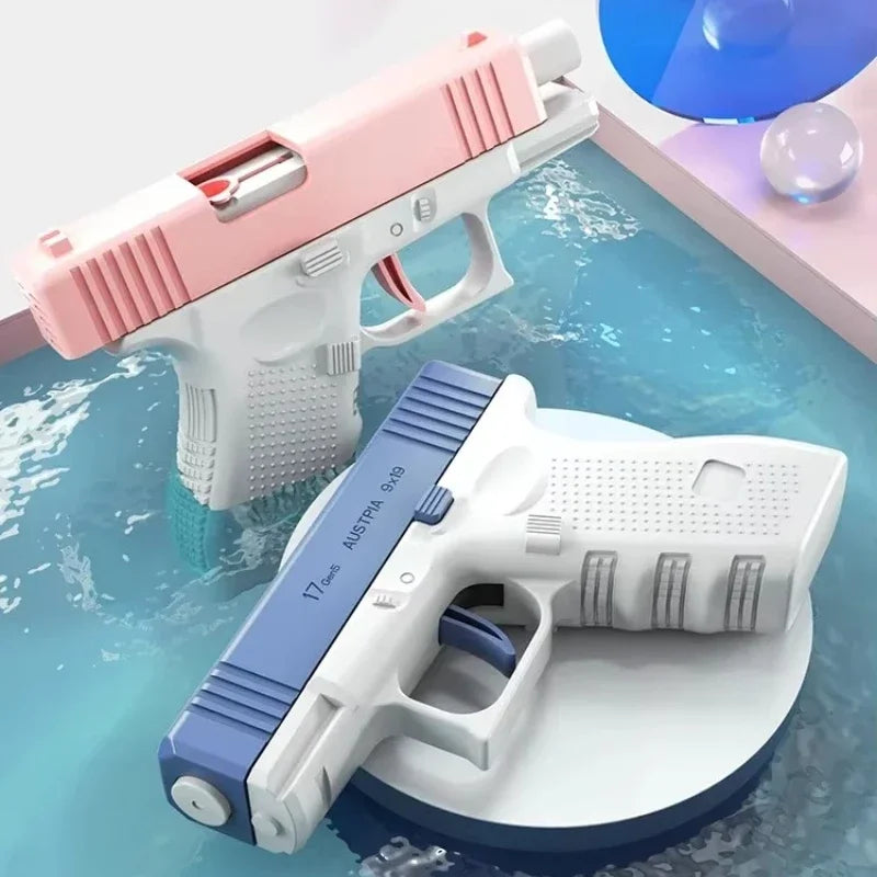 A pink and white high-pressure water blaster toy gun is shown on a light blue surface.