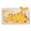 A wooden set of three yellow Triceratops animals used for threading and stacking toys.