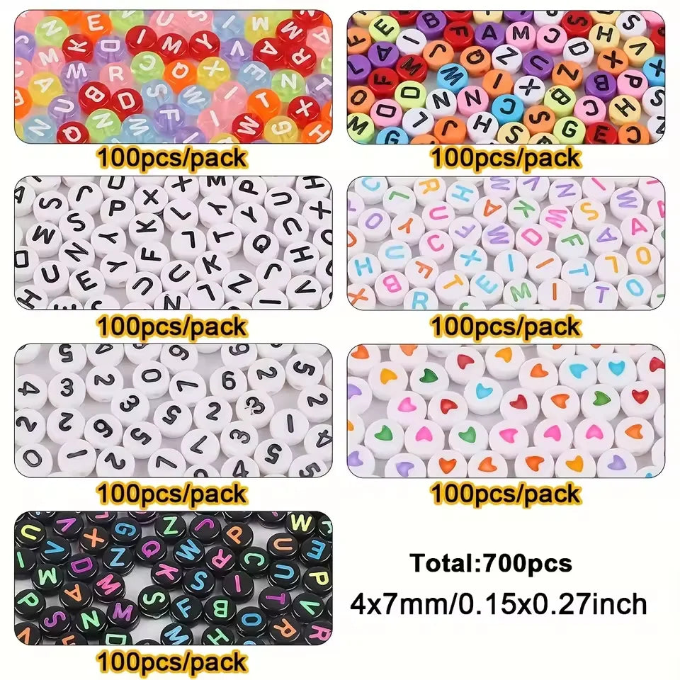 A collection of 700 acrylic alphabet and number beads packaged in packs for jewelry making