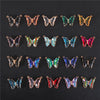 A collection of crystal butterfly charm beads in various colors and finishes for jewelry making.