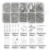 A collection of silver jewelry making supplies including various beads wire tools and findings organized in compartments.