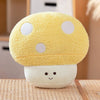 A yellow mushroom plush toy with white spots sits on a light-colored surface.