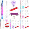 A collection of diamond painting tools including pens, rollers, and various tips in pink, green, and clear plastic.