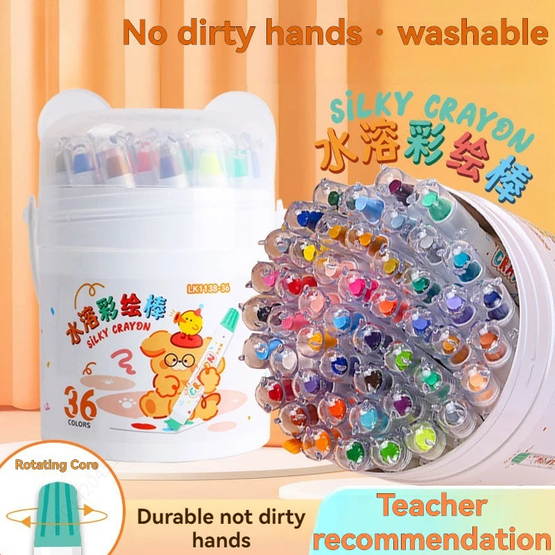 A white container of silky crayon wax and a loose collection of colorful twistable gel crayons for kids.