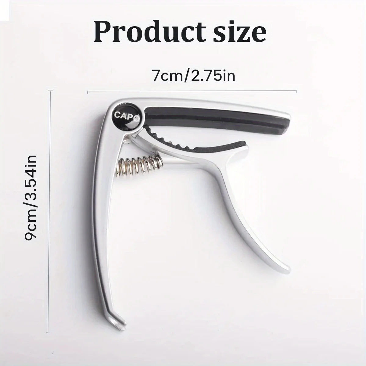Silver aluminum alloy quick-change guitar capo with a black grip and metal pins