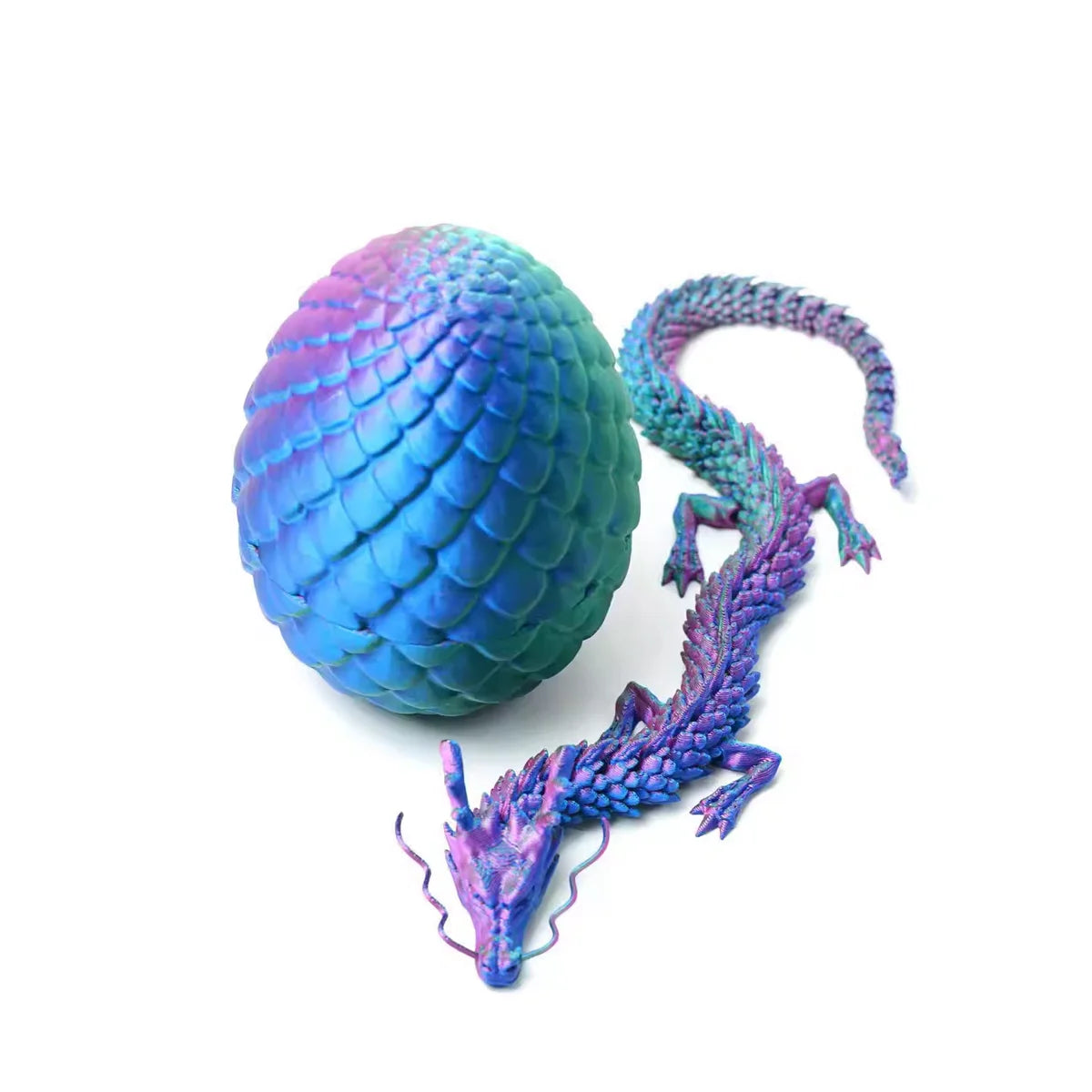 A vibrant blue and purple dragon egg with a serpentine dragon toy emerging from it.