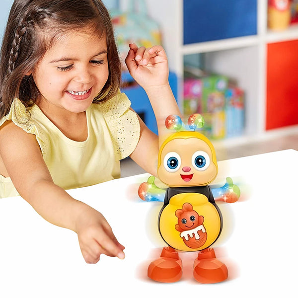 A young girl is interacting with an electric dancing bee musical toy.