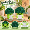 Handmade crochet broccoli doll with a motivational message and cute expression