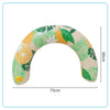 A beige inflatable U-shaped swim ring with a tropical leaf and citrus pattern, designed for neck and back support.