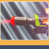 A close-up of an LED light-up water mist blaster toy gun with a green and gray body, aimed forward.